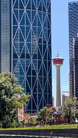 View of The Bow skyscraper and Calgary Tower in downtown Calgary, a key region for our Calgary security service operations.